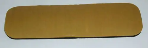 Braune isolierende Fläche mit abgerundeten Kanten, geeignet für die Rückseite eines Daikin Produkts zur thermischen Isolation.